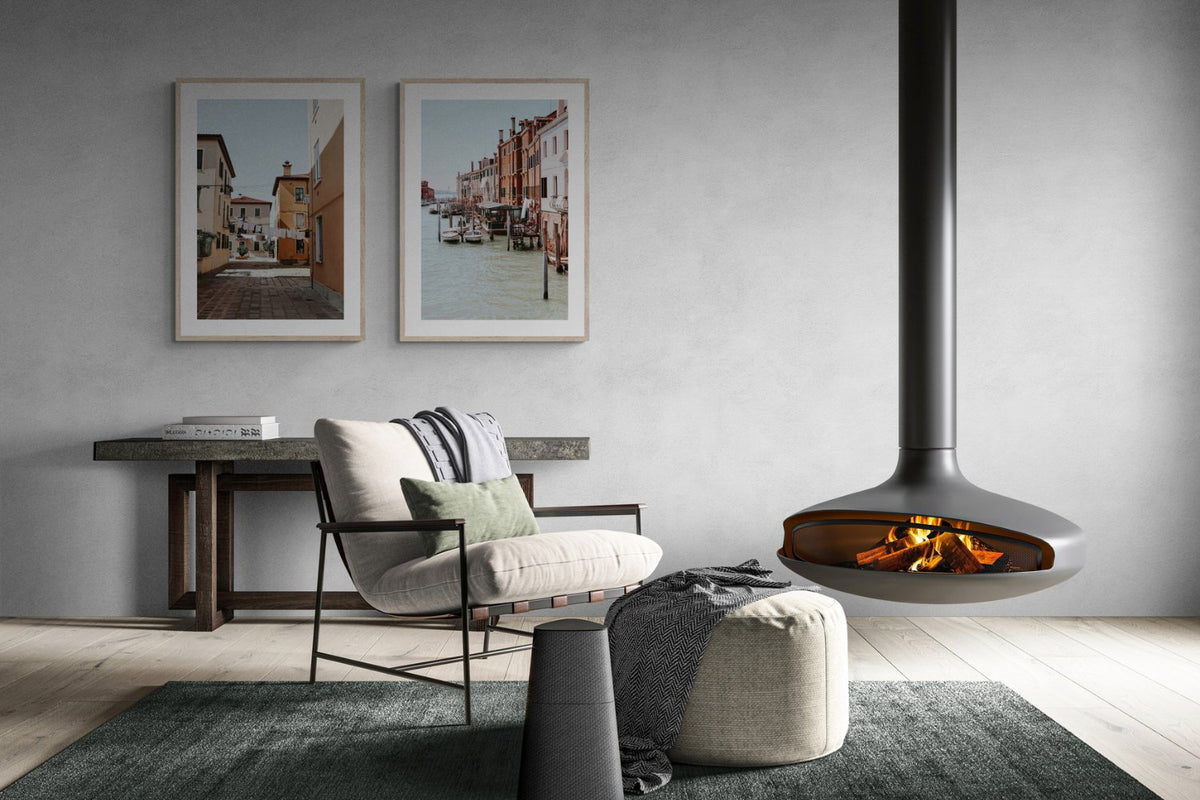 Dark fireplace and soft seating in a calm contemporary living room