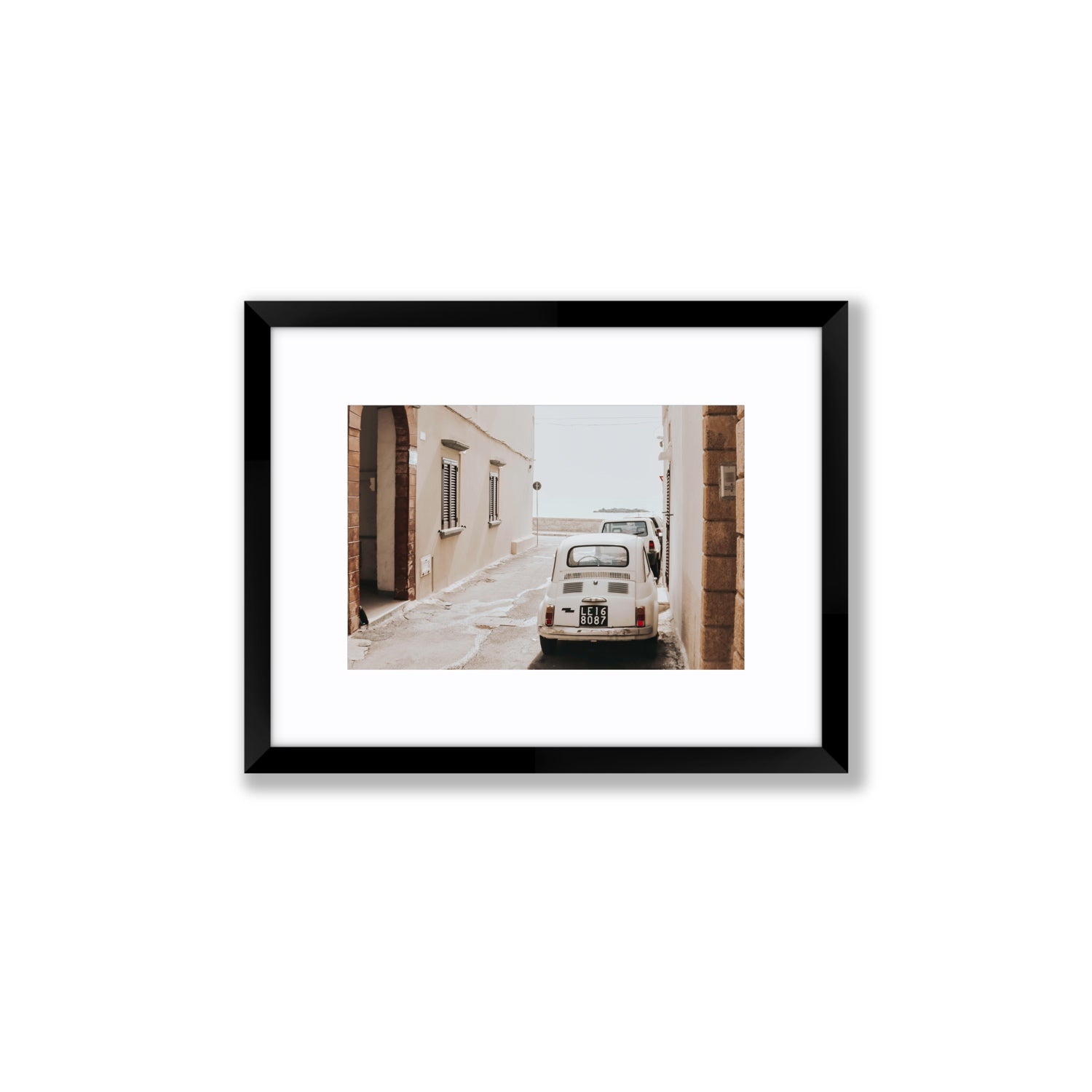 Bambini Lane Puglia Italian wall art Small fine art print in black frame with matboard