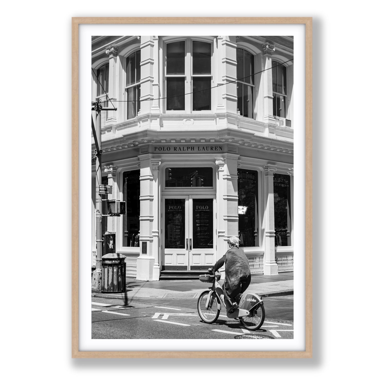 Downtown Rider New York NYC Black & White wall art Statement fine art print in natural oak frame with matboard