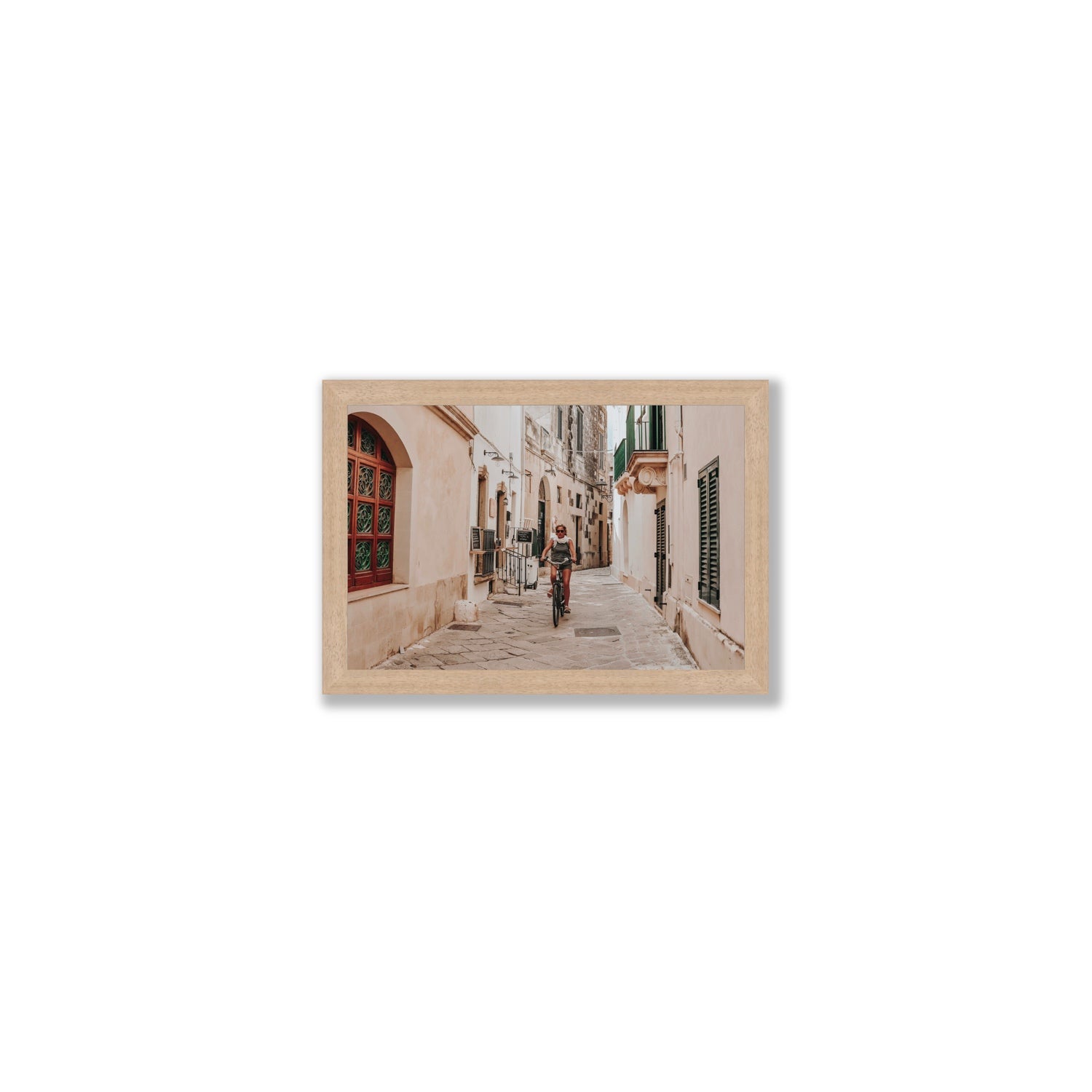 La Donna In Bicicletta Puglia Wall Italian fine art print Small full-bleed fine art print in natural oak frame