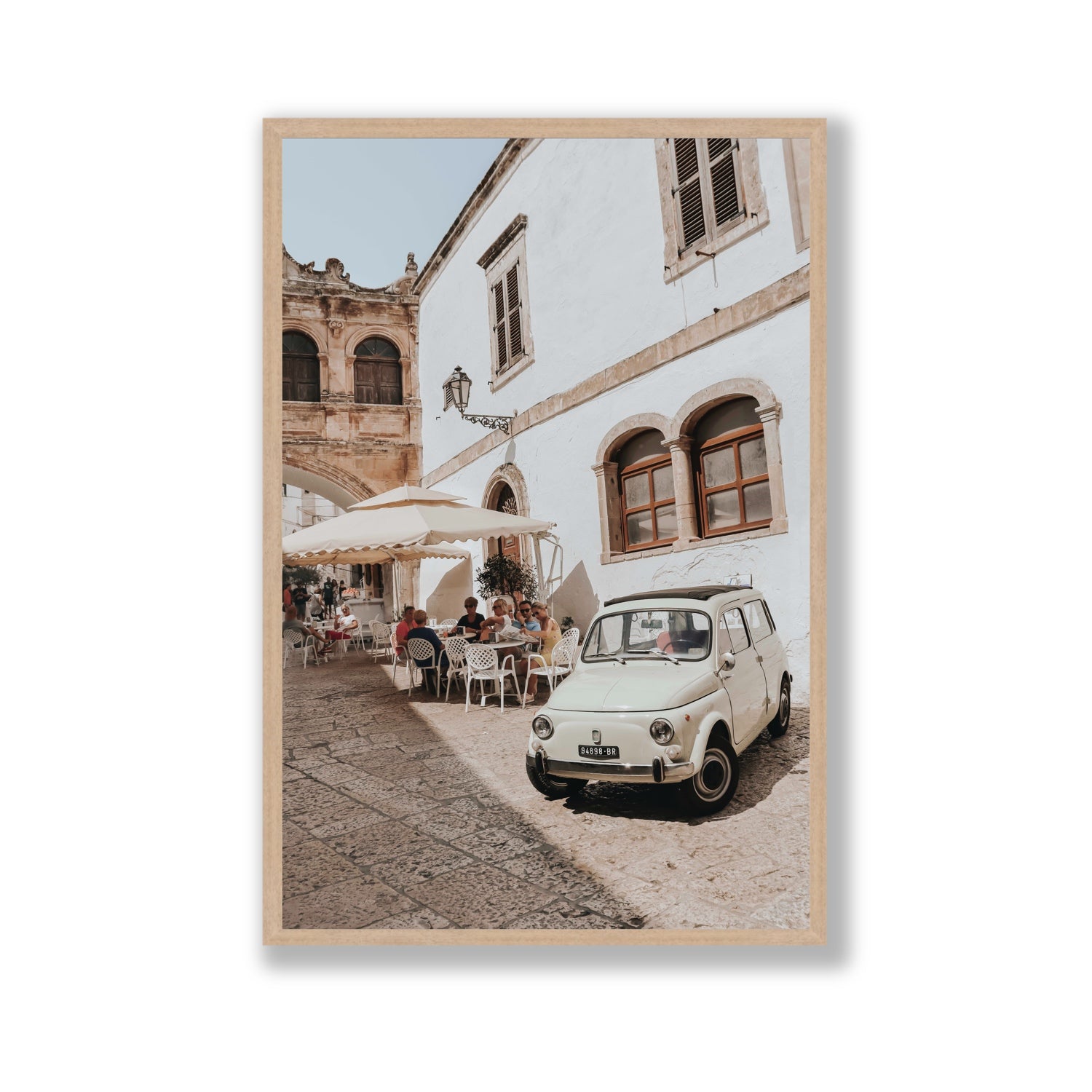 Piazza di Ostuni Puglia Italian wall art Gallery full-bleed fine art print in natural oak frame