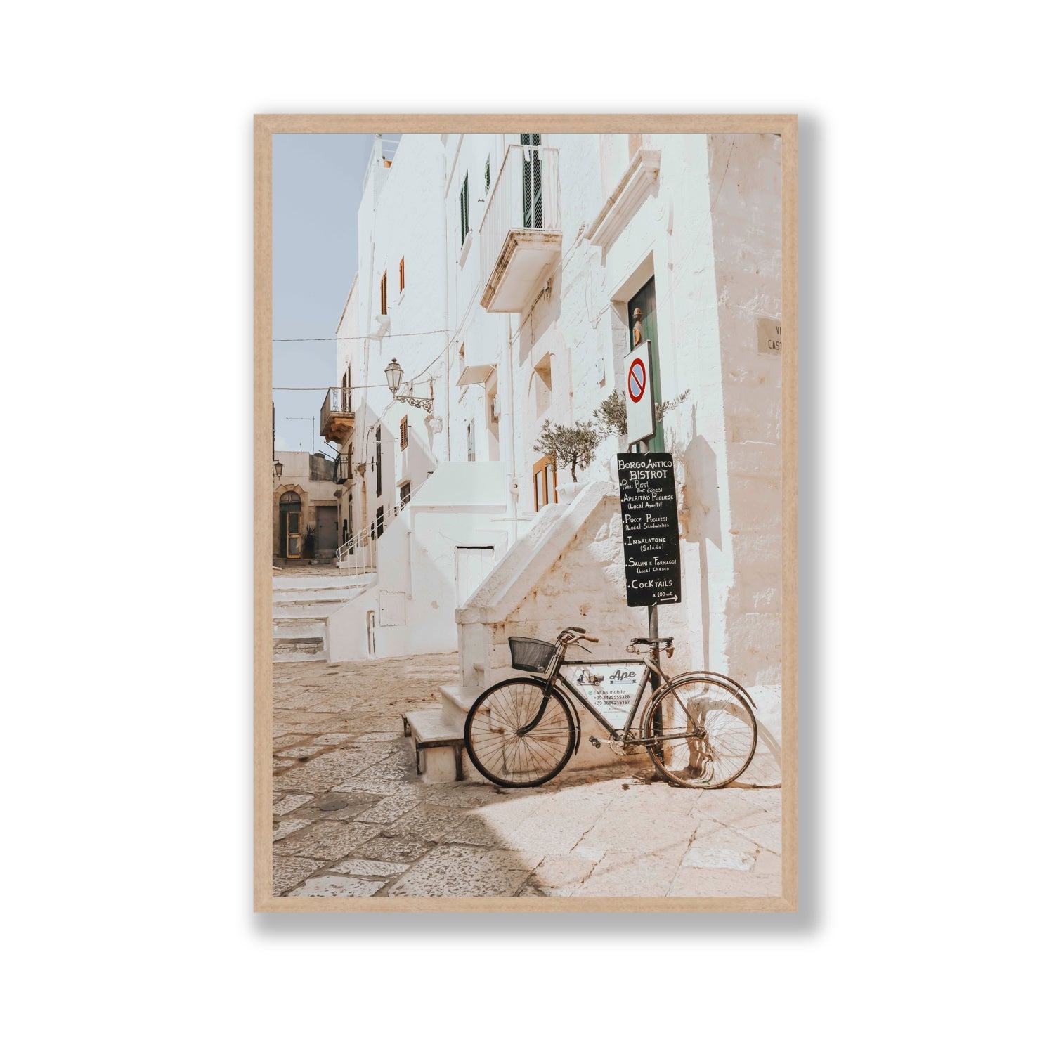 La Bicicletta Puglia Ostuni wall art Gallery full-bleed fine art print in natural oak frame