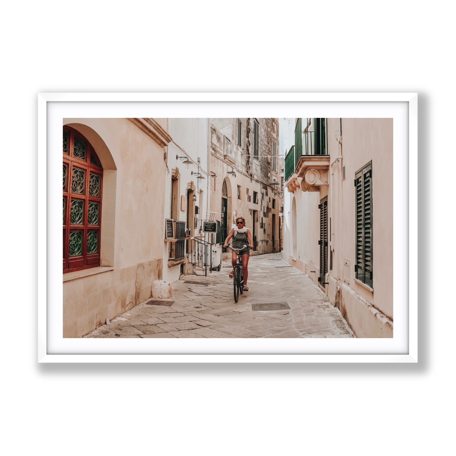 La Donna In Bicicletta Puglia Wall Italian fine art print Gallery fine art print in white frame with matboard