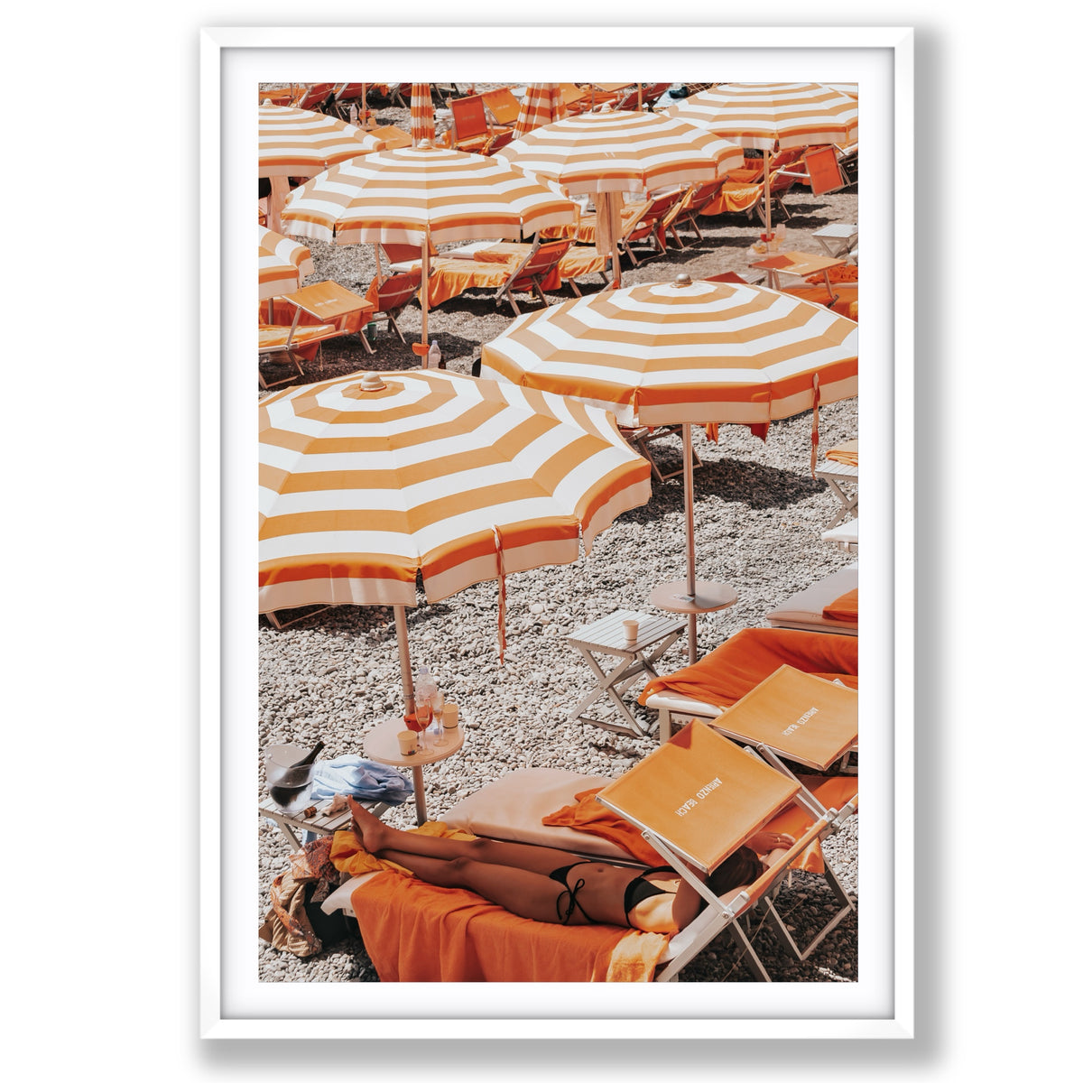 Beach Mode Positano, orange striped umbrellas, loungers and sunbather on pebbles, main fine art print image
