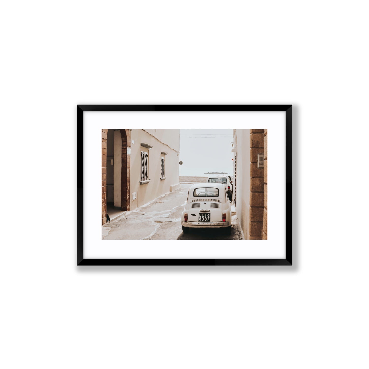 Bambini Lane Puglia Italian wall art Medium fine art print in black frame with matboard
