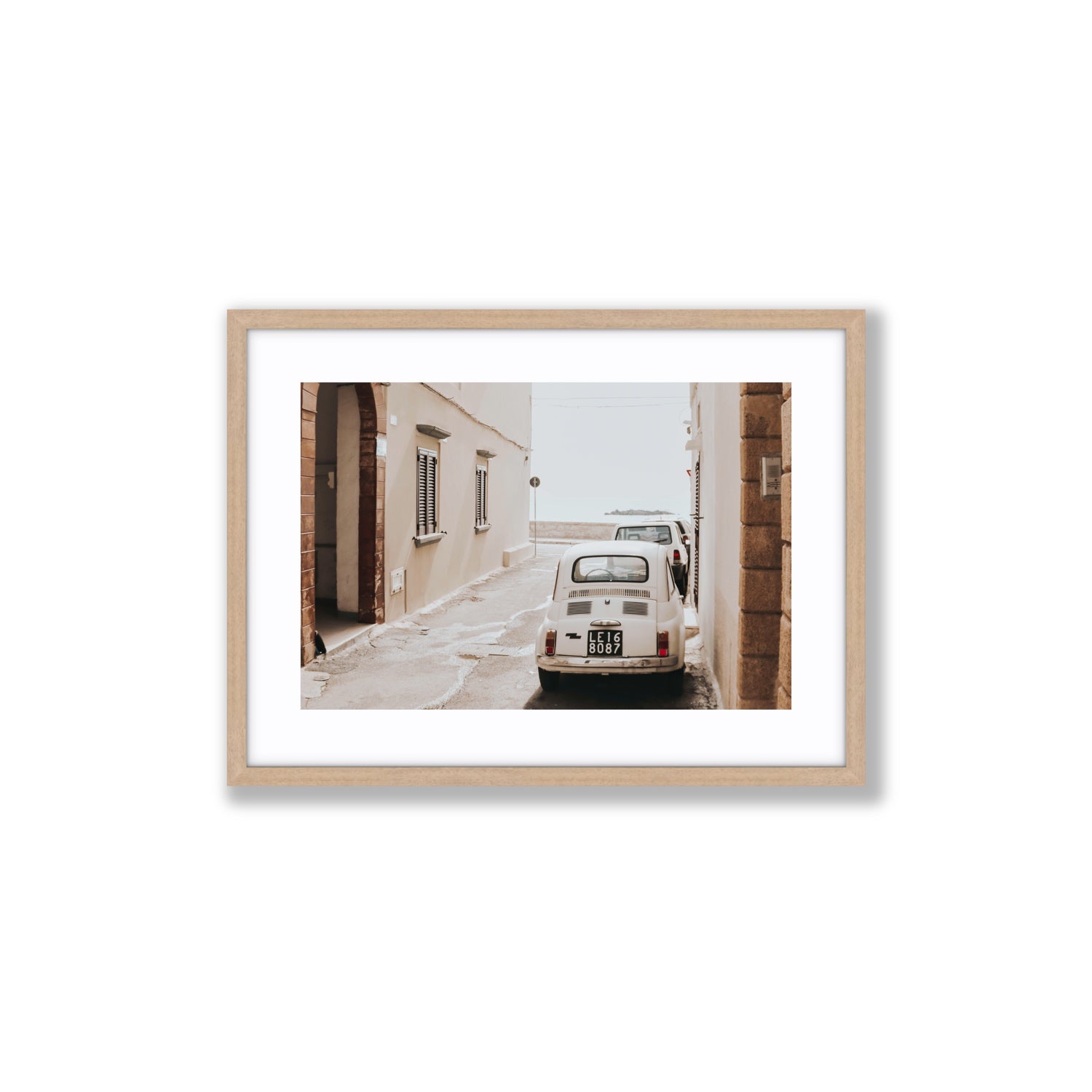 Bambini Lane Puglia Italian wall art Medium fine art print in natural oak frame with matboard
