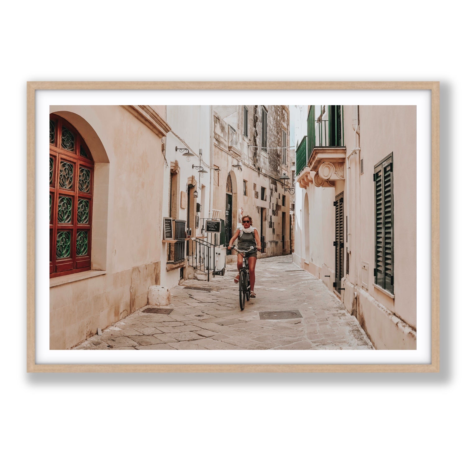 La Donna In Bicicletta Puglia Wall Italian fine art print Statement fine art print in natural oak frame with matboard