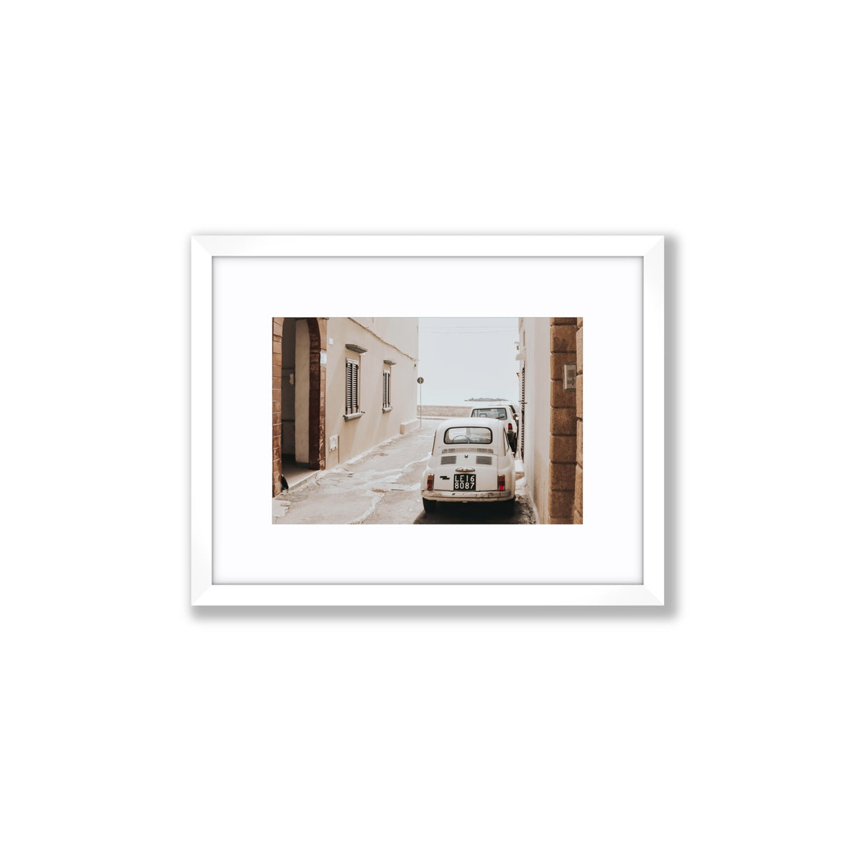 Bambini Lane Puglia Italian wall art Small fine art print in white frame with matboard