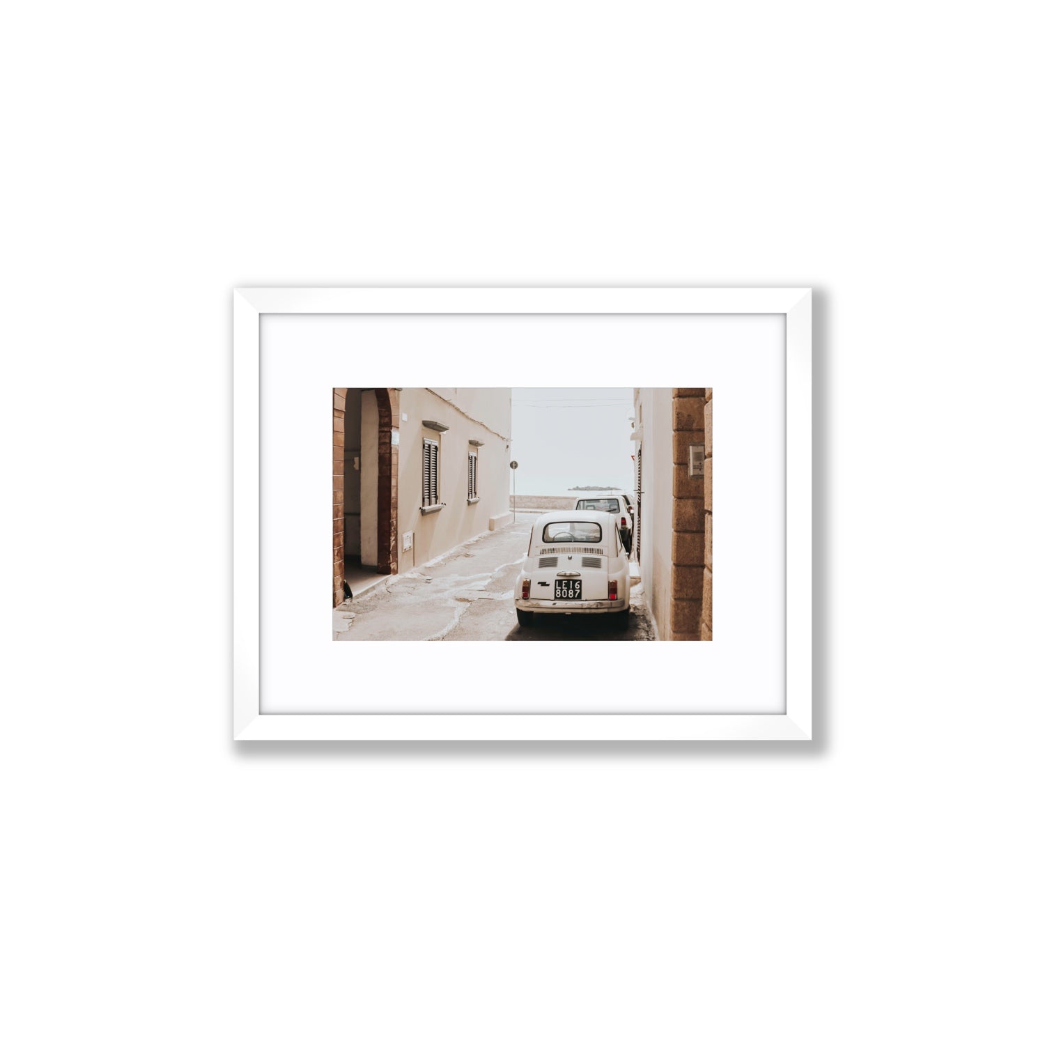 Bambini Lane Puglia Italian wall art Small fine art print in white frame with matboard