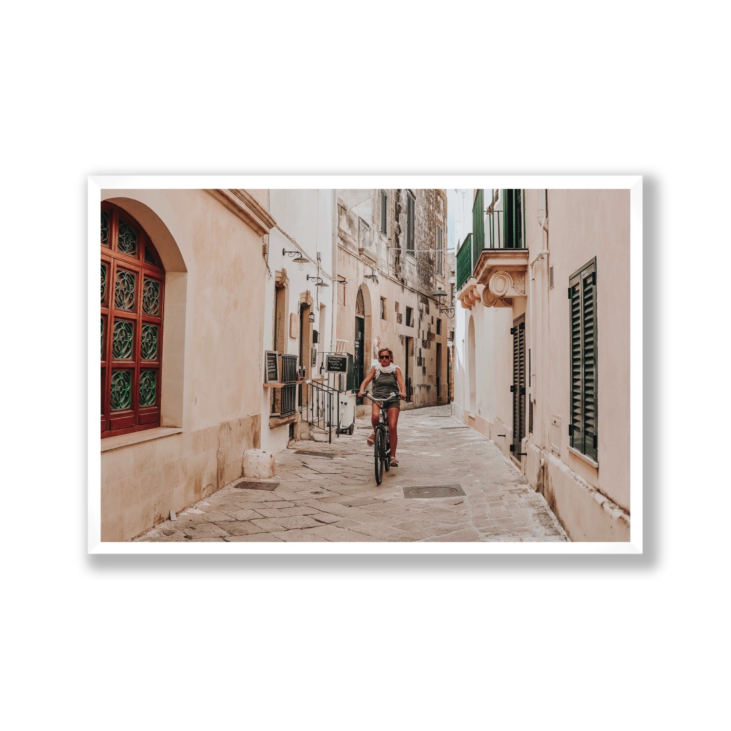 La Donna In Bicicletta Puglia Wall Italian fine art print Gallery full-bleed fine art print in white frame