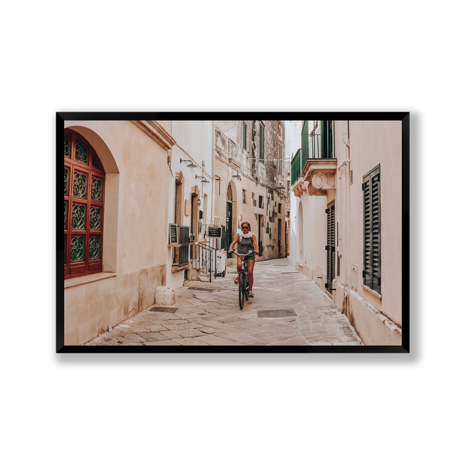 La Donna In Bicicletta Puglia Wall Italian fine art print Gallery full-bleed fine art print in black frame