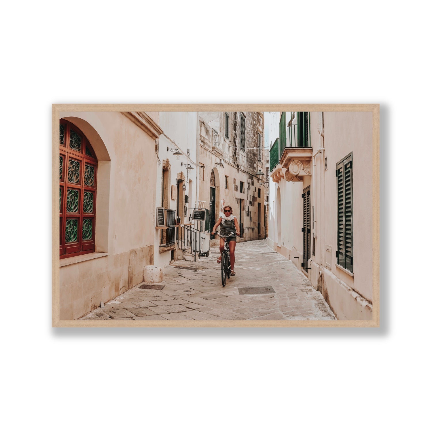 La Donna In Bicicletta Puglia Wall Italian fine art print Gallery full-bleed fine art print in natural oak frame