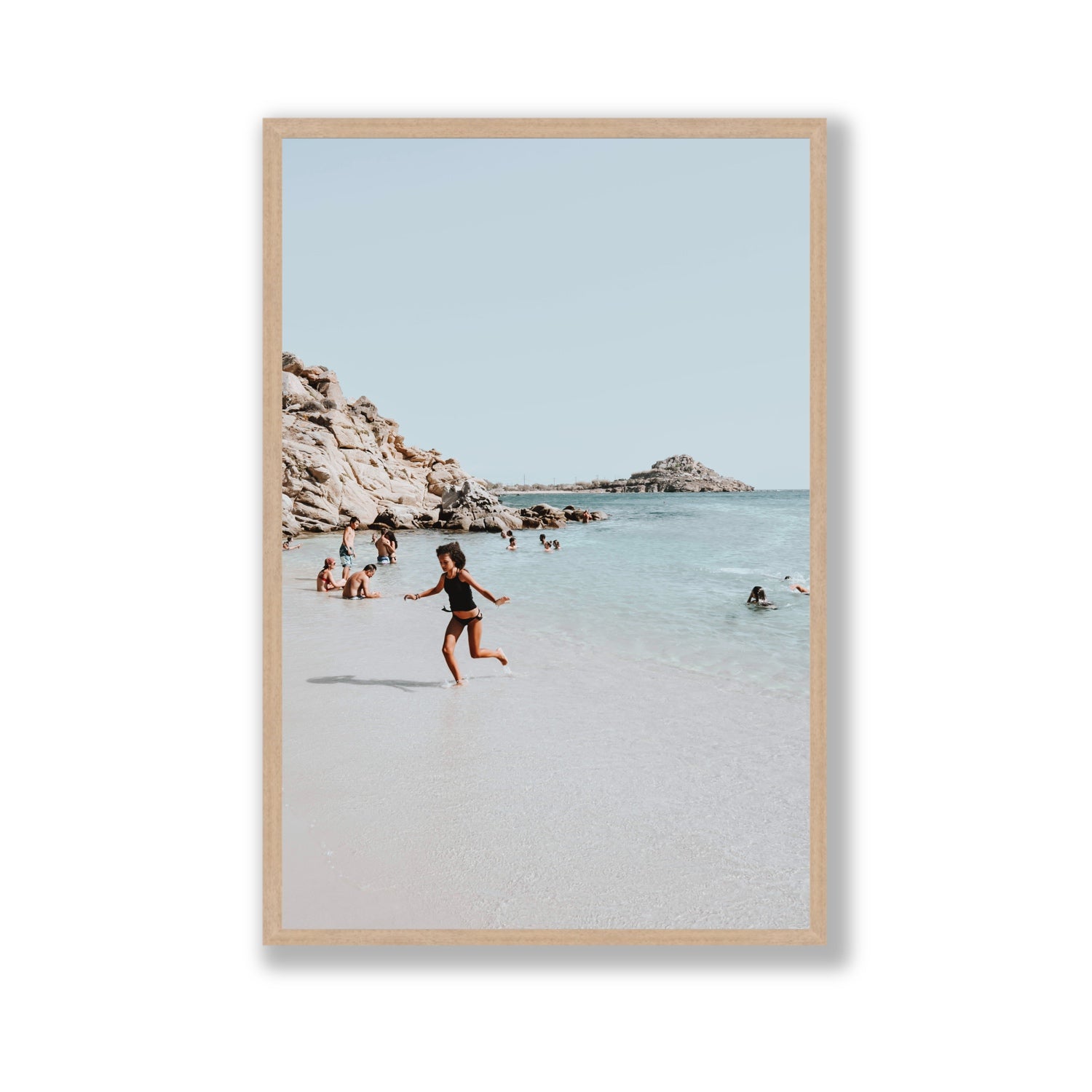 Skipping Angel Mykonos Greek island decor wall art Gallery full-bleed fine art print in natural oak frame