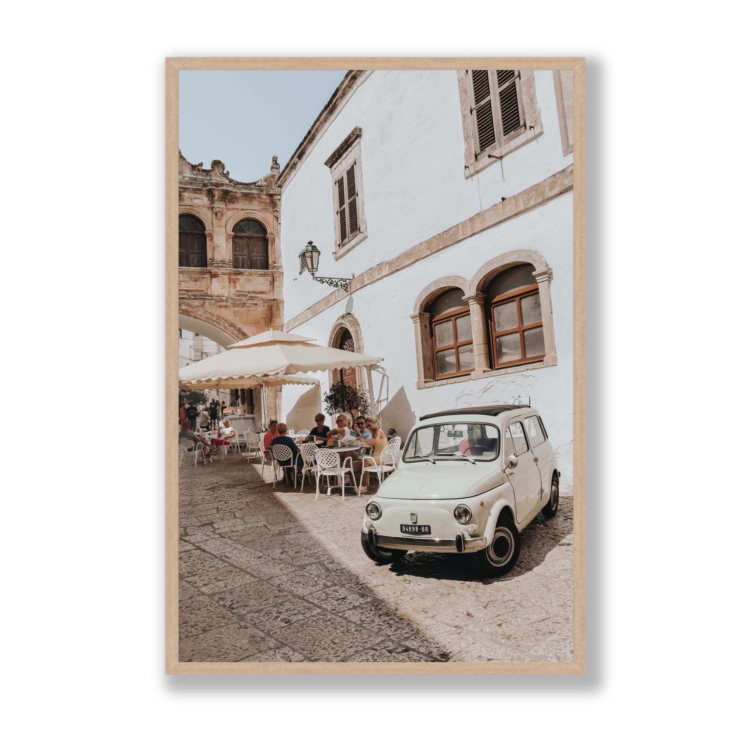 Piazza di Ostuni Puglia Italian wall art Statement full-bleed fine art print in natural oak frame