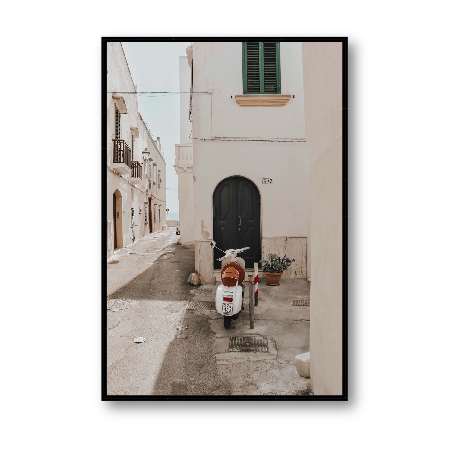 La Casa 42 Puglia Gallipoli Italian wall art Statement fine art canvas in black float frame