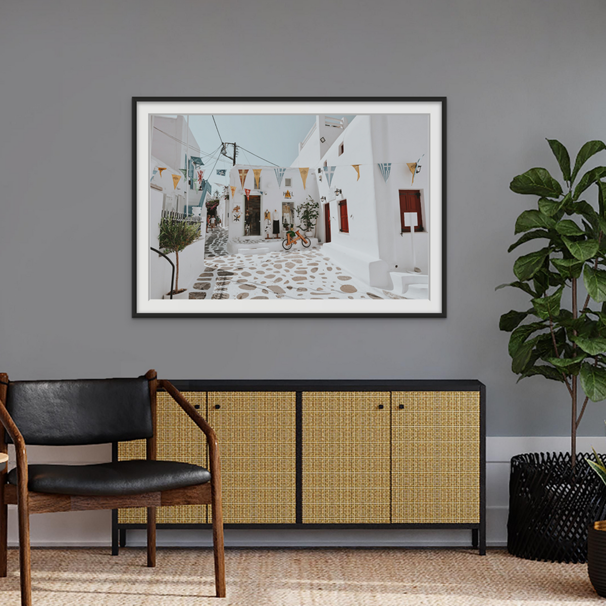 Cruising The Streets Mykonos Greek island wall art framed print styled in a room view 2