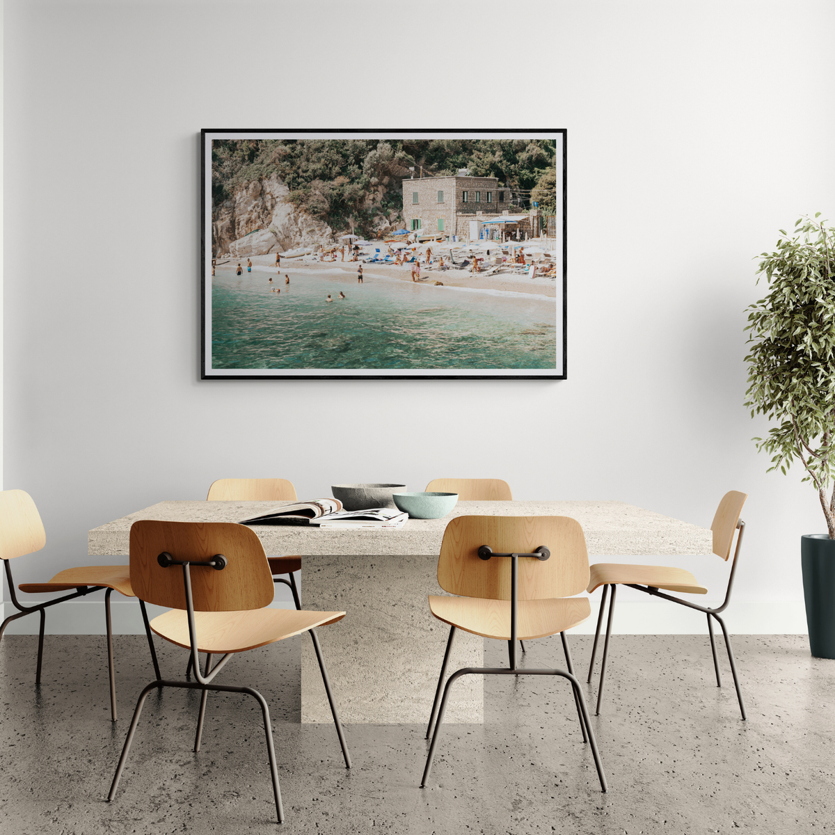 Amichi Co coastal artwork styled above a dining table