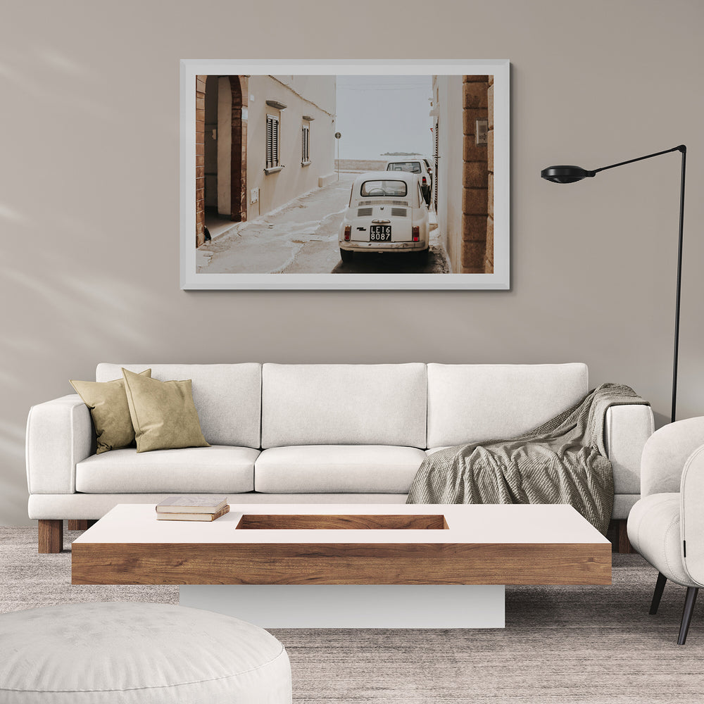 Bambini Lane Puglia Italian wall art white framed print styled in a room