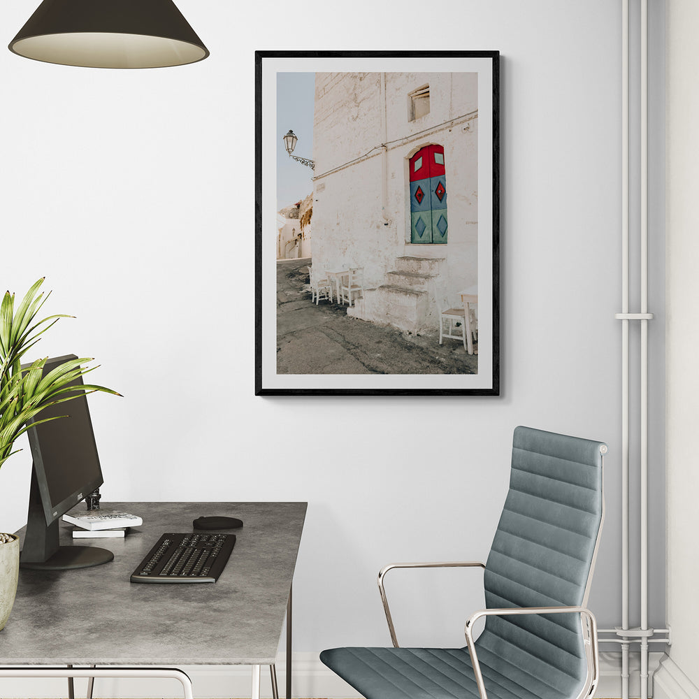 Doorway Delight Puglia Ostuni wall art black framed print styled in a room
