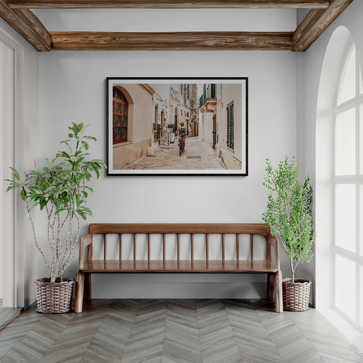 La Donna In Bicicletta Puglia Wall Italian fine art print black framed print styled in a room