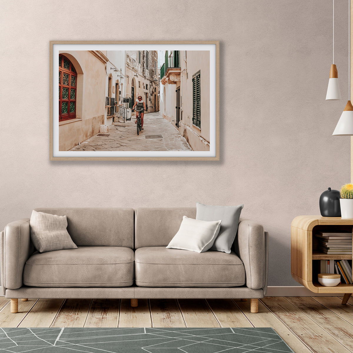 La Donna In Bicicletta Puglia Wall Italian fine art print natural oak framed print styled in a room