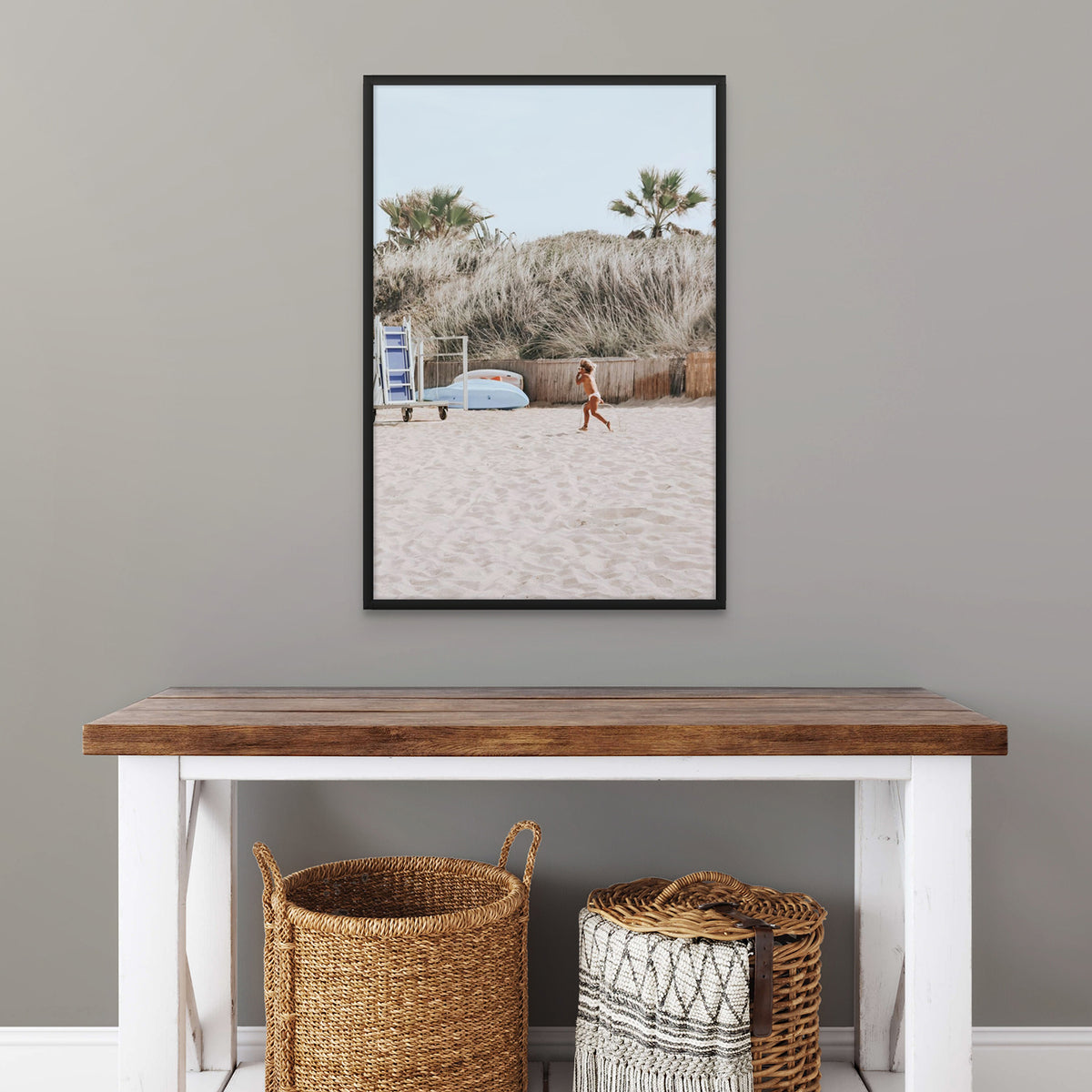 Little Explorer Puglia beach coastal wall art black framed print styled in a room