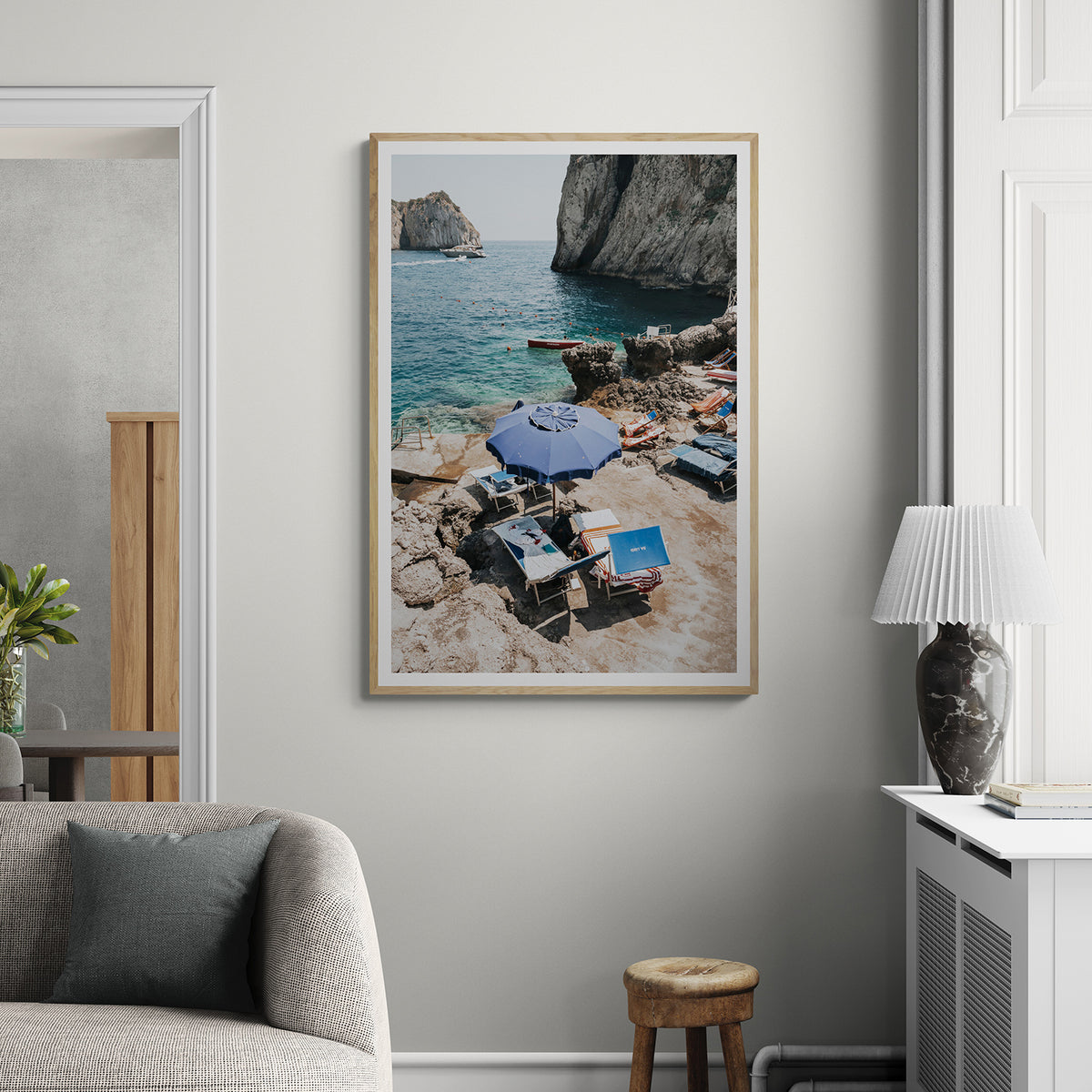 Lonely Loungers Capri coastal wall art natural oak framed print styled in a room