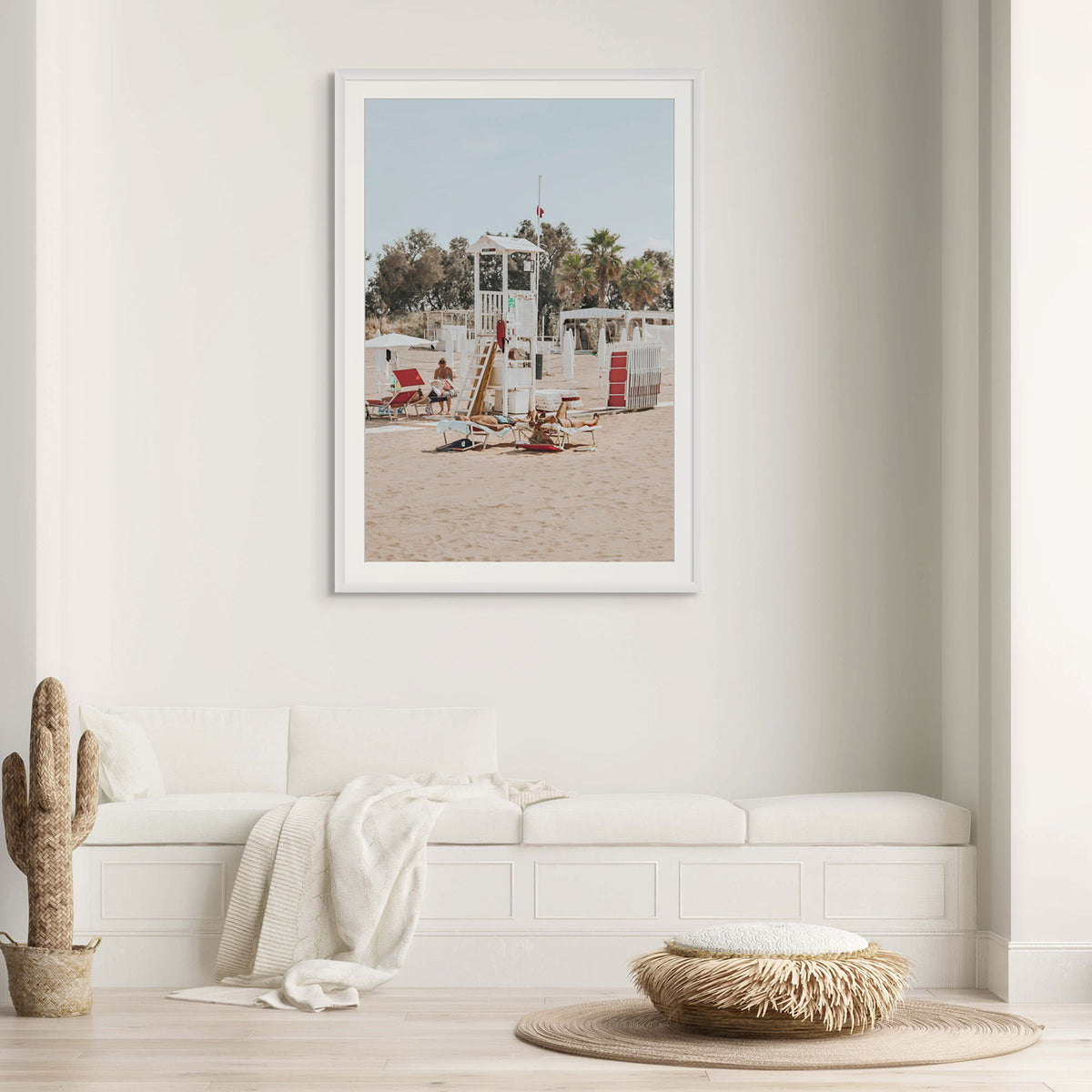 Red Lounge Reverie Puglia beach coastal wall art white framed print styled in a room