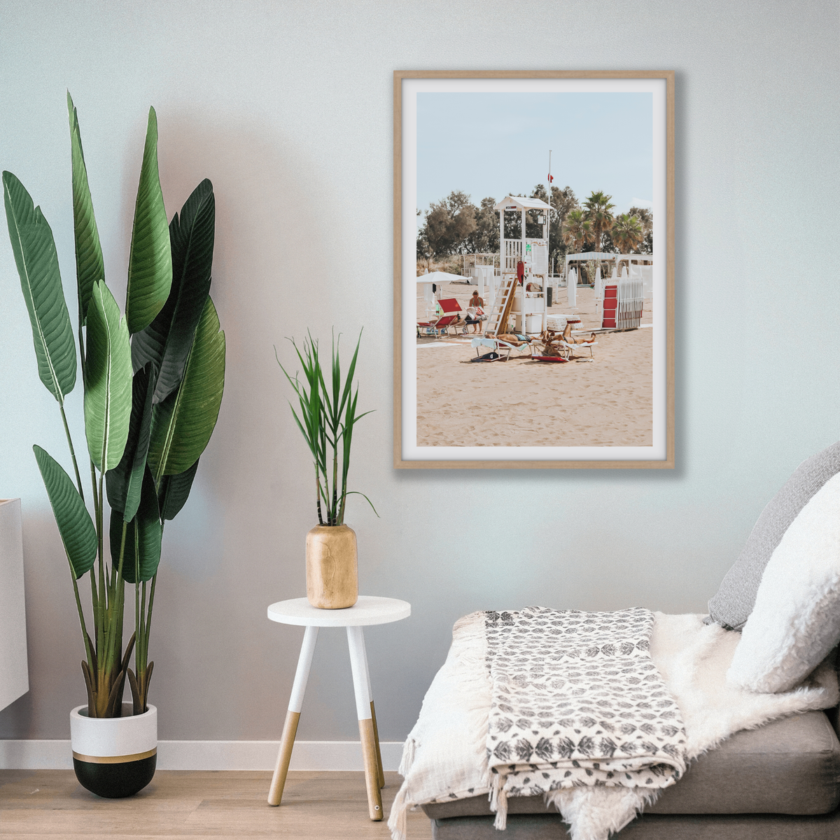 Red Lounge Reverie Puglia beach coastal wall art natural oak framed print styled in a room