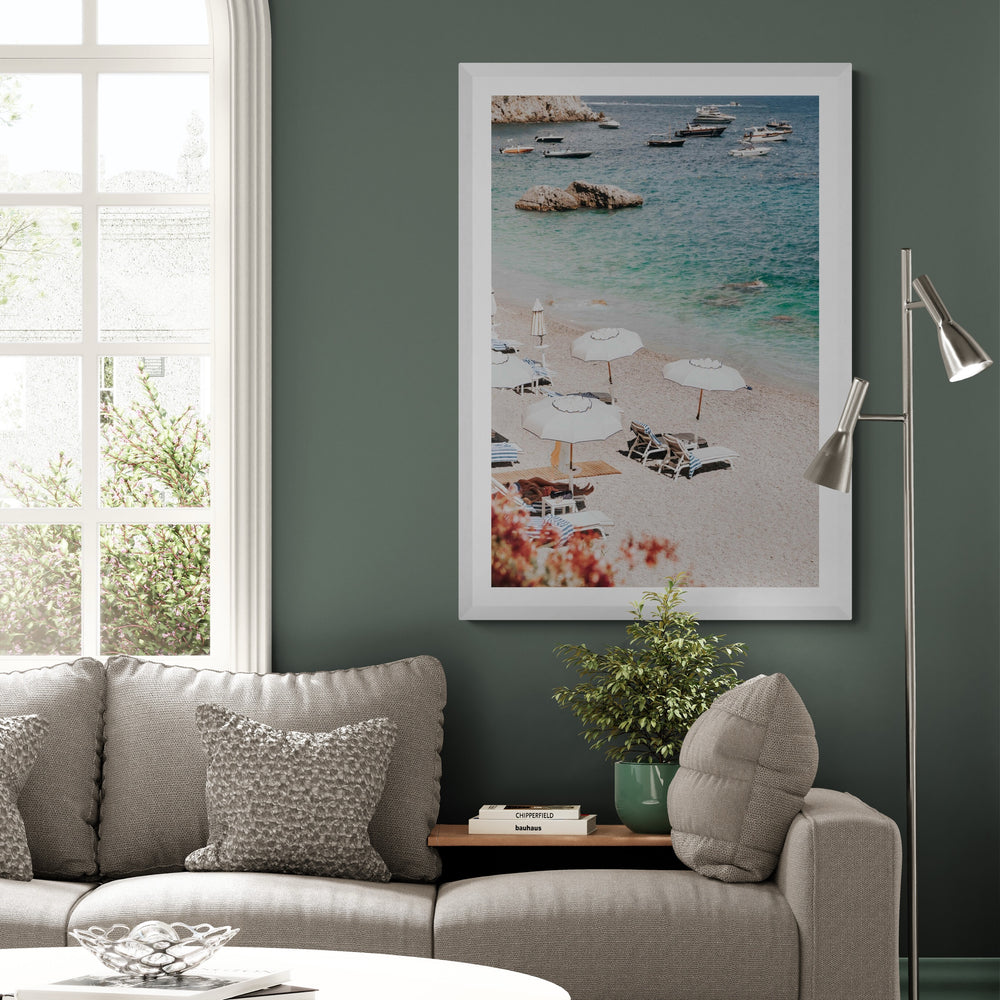 Romantic Escape Amalfi, pebbled Amalfi beach with white umbrellas and turquoise sea, framed print styled in a room view 3