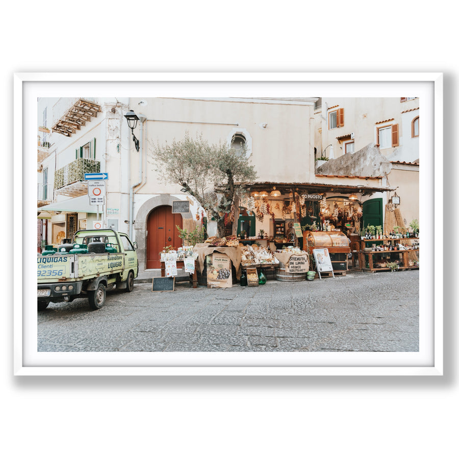 Mercatino Ischia, cobbled street market stall with olive tree and green truck, main fine art print image