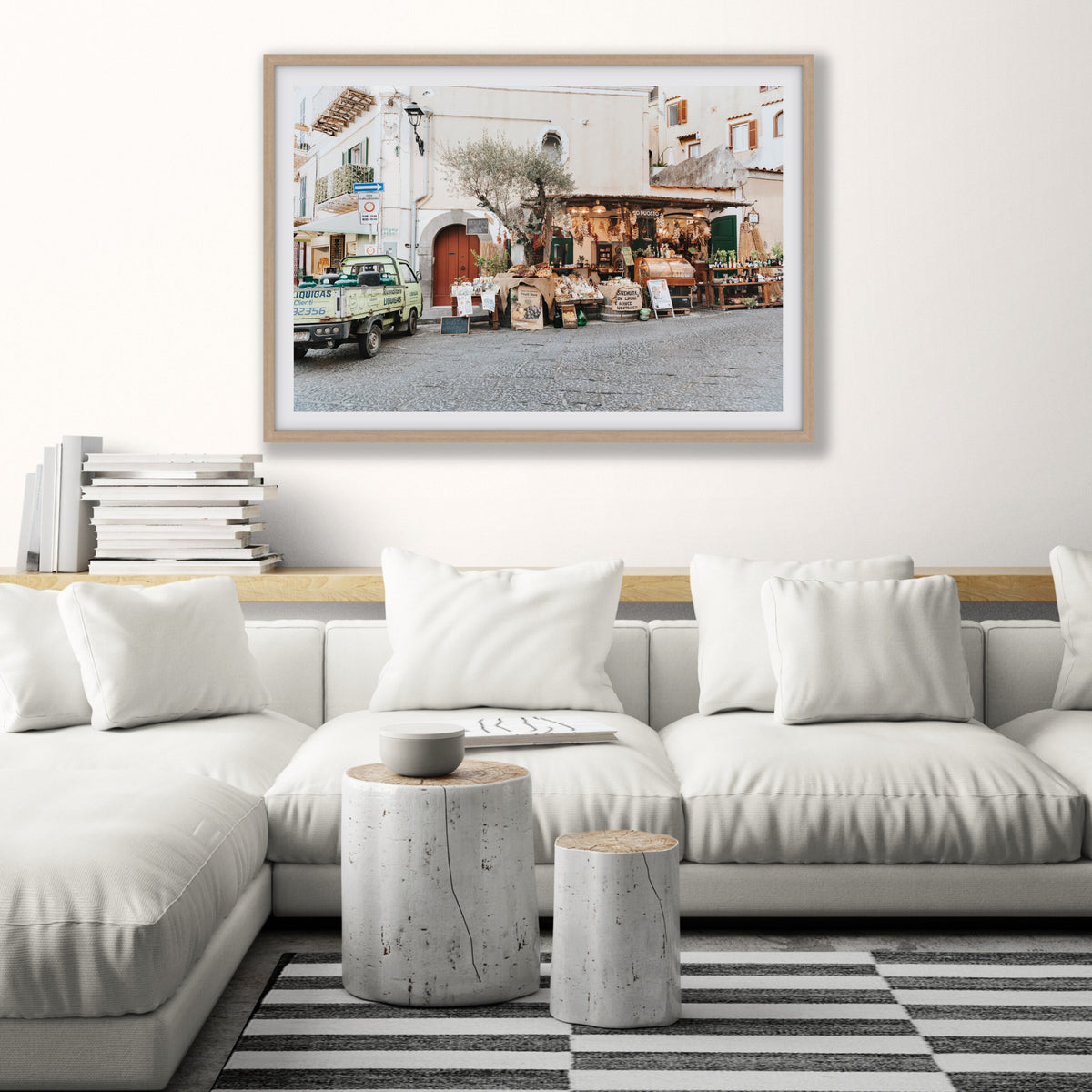 Mercatino Ischia, cobbled street market stall with olive tree and green truck, framed print styled in a room view 5